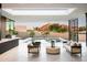 Stunning outdoor patio with a pool, lounge seating, and picturesque mountain views at 6623 N Hillside Dr, Paradise Valley, AZ 85253