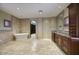 Elegant bathroom with soaking tub, walk-in shower, and large vanity at 8000 E Mariposa Grande Dr, Scottsdale, AZ 85255