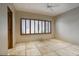 Bright bedroom with wood floors and plantation shutters at 8000 E Mariposa Grande Dr, Scottsdale, AZ 85255