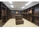 Large walk-in closet with ample shelving and hanging space at 8000 E Mariposa Grande Dr, Scottsdale, AZ 85255