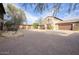 Large courtyard with multiple garages and paved surface at 8000 E Mariposa Grande Dr, Scottsdale, AZ 85255