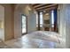 Spacious living room with fireplace and large windows at 8000 E Mariposa Grande Dr, Scottsdale, AZ 85255