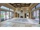 Spacious living room with fireplace and large windows at 8000 E Mariposa Grande Dr, Scottsdale, AZ 85255