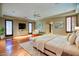 Main bedroom with hardwood floors and large windows at 8000 E Mariposa Grande Dr, Scottsdale, AZ 85255