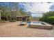 Inviting pool and spa with brick patio and mountain views at 8000 E Mariposa Grande Dr, Scottsdale, AZ 85255