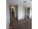 Bedroom view showing access to hallway and ensuite bathroom at 245 S 56Th St # 209, Mesa, AZ 85206