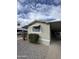 Charming single-Gathering home featuring desert landscaping, covered parking, and a cozy exterior at 245 S 56Th St # 209, Mesa, AZ 85206