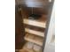 Pantry featuring pull-out shelving for easy organized storage of cookware and kitchenware at 15626 N 50Th St, Scottsdale, AZ 85254