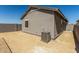 View of the home's backyard with low maintenance landscaping at 5678 N 205Th Ln, Buckeye, AZ 85396