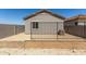 Home's backyard featuring low maintenance desert landscaping at 5678 N 205Th Ln, Buckeye, AZ 85396