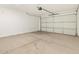 Garage boasts ample space and a modern garage door at 16025 W Cottontail Ln, Surprise, AZ 85387