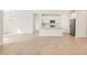 Open floor plan featuring kitchen island and appliances at 16025 W Cottontail Ln, Surprise, AZ 85387