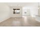 Open-concept living space with views of the dining room and kitchen at 16025 W Cottontail Ln, Surprise, AZ 85387