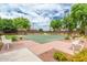 Inviting basketball court with seating, surrounded by mature trees, providing a recreational space for residents at 901 W Witt Ave, Queen Creek, AZ 85140