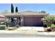 Single-story home featuring desert landscaping, a two-car garage, and a covered front porch at 901 W Witt Ave, Queen Creek, AZ 85140