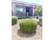 Inviting front yard with desert landscaping and a charming covered porch on a single-story home at 901 W Witt Ave, Queen Creek, AZ 85140