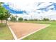 Sand volleyball court surrounded by green lawns, offering a recreational space for residents and visitors at 901 W Witt Ave, Queen Creek, AZ 85140