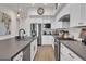 Modern kitchen with white cabinets, gray countertops and stainless steel appliances at 5151 N 13Th Pl # 4, Phoenix, AZ 85014