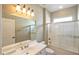 Clean bathroom with a tub, vanity, and chrome fixtures at 13668 W Figueroa Dr, Sun City West, AZ 85375