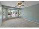Spacious bedroom with large windows provides natural light and views of the outdoors at 13668 W Figueroa Dr, Sun City West, AZ 85375
