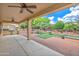 Inviting covered patio, perfect for entertaining with lovely backyard at 13668 W Figueroa Dr, Sun City West, AZ 85375
