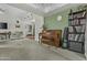 Inviting living room with comfortable seating, piano, and seamless flow to other rooms at 6159 S Avenida Del Sol --, Gold Canyon, AZ 85118