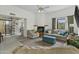 Comfortable living room features neutral tones, a fireplace, and lots of natural light at 6159 S Avenida Del Sol --, Gold Canyon, AZ 85118