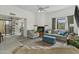 Comfortable living room features neutral tones, a fireplace, and lots of natural light at 6159 S Avenida Del Sol --, Gold Canyon, AZ 85118