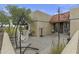 Private patio features a hammock, basketball hoop, and desert surroundings at 6159 S Avenida Del Sol --, Gold Canyon, AZ 85118