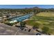 Aerial view of community with tennis courts, golf course, and parking at 14235 N Piping Rock Ct, Phoenix, AZ 85023