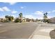 Residential street view with homes and landscaping at 8660 N 114Th Ave, Peoria, AZ 85345