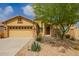 Charming single-story home with a well-maintained desert landscaped front yard and two car garage at 2156 E Aloe Pl, Chandler, AZ 85286