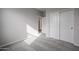 Bright bedroom with doors and carpet flooring at 2646 E Bluff Spring Ave, Apache Junction, AZ 85119