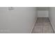 Clean hallway with tile flooring and neutral walls at 2646 E Bluff Spring Ave, Apache Junction, AZ 85119