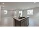 Kitchen island with granite countertop and sink at 2646 E Bluff Spring Ave, Apache Junction, AZ 85119