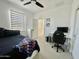 Bedroom featuring a desk and chair set up for gaming or studying with the bed close by at 6437 N 17 St, Phoenix, AZ 85016