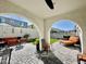 Covered outdoor patio featuring arched openings and outdoor furniture, creating a cozy entertainment space at 6437 N 17 St, Phoenix, AZ 85016