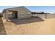 Large backyard with block wall and covered patio at 16006 W Cottontail Ln, Surprise, AZ 85387