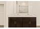 Double vanity bathroom with modern finishes at 16006 W Cottontail Ln, Surprise, AZ 85387