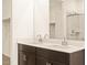 Double vanity and large mirror in main bath at 16006 W Cottontail Ln, Surprise, AZ 85387