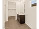 Bathroom with double vanity and walk-in shower at 16006 W Cottontail Ln, Surprise, AZ 85387