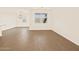 Bright dining area with large windows and tile floors at 16006 W Cottontail Ln, Surprise, AZ 85387