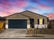 A charming one-story home with a two-car garage at 16006 W Cottontail Ln, Surprise, AZ 85387
