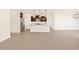 Open concept kitchen and living area with modern finishes at 16006 W Cottontail Ln, Surprise, AZ 85387