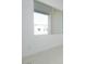 Interior window view, showcasing the home's neutral color palette and modern design at 4799 W Flat Iron Ct, Queen Creek, AZ 85144