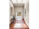 Bright foyer with skylights, opens to a patio with an inviting desert landscape at 6301 N 51St Pl, Paradise Valley, AZ 85253