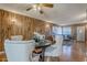 Light and airy dining room with hardwood floors and wood paneling at 7243 E Portland St, Scottsdale, AZ 85257