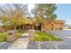 House exterior with stone accents and a large yard at 10042 S Greenfield Rd, Gilbert, AZ 85234