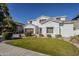 Two story house with a landscaped lawn and a two car garage at 718 E Scorpio Pl, Chandler, AZ 85249