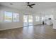 Gathering room with sliding door to backyard and kitchen access at 718 E Scorpio Pl, Chandler, AZ 85249